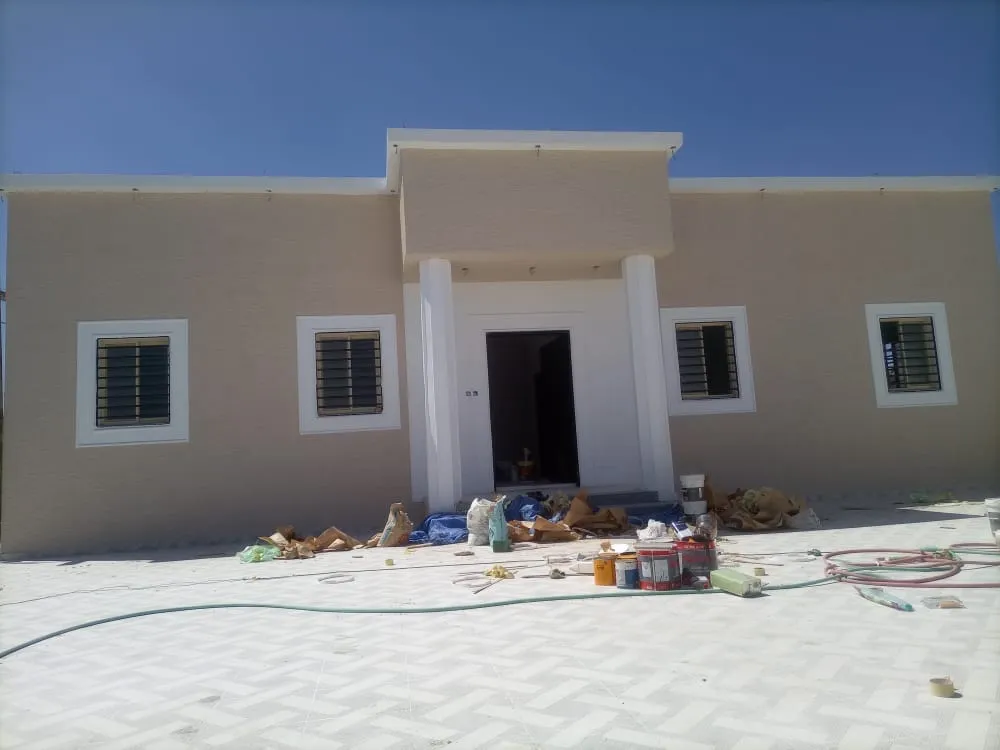 دهان واجهة عمارة سكنية تجارية متكاملة